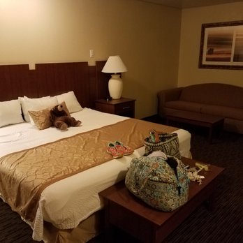 St. George Inn & Suites - Lounging in our spacious King room. The sofa in the back folds out into a Queen bed. - Hotels Near Me - Saint George, Utah St. George Inn & Suites - Lounging in our spacious King room. The sofa in the back folds out into a Queen bed. - Hotels Near Me - Saint George, Utah