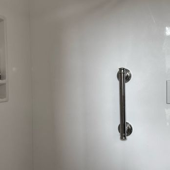 Columbus Bath Design - on wall slab, taken all the way to the bathroom door frame - Kitchen & Bath Near Me - Lewis Center, Ohio