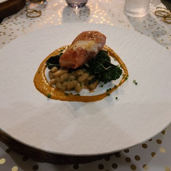 Blackie's - Prosciutto wrapped halibut over kale, chard and slow simmered cannellini beans. Divine! - American Near Me - Smithfield, Rhode Island Blackie's - Prosciutto wrapped halibut over kale, chard and slow simmered cannellini beans. Divine! - American Near Me - Smithfield, Rhode Island