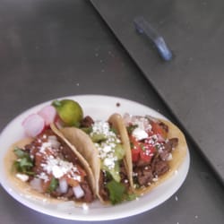 Twisted Tacos - Three Tacos. Your choice of either Carne Asad or AL Pastor with your choice of garnishes and Salsas