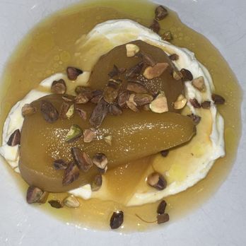 Monti's - Poached pears over delice de valle cheese mousse, orange blossom honey and toasted pistachios! Just amazing - Mediterranean Near Me - Santa Rosa, California Monti's - Poached pears over delice de valle cheese mousse, orange blossom honey and toasted pistachios! Just amazing - Mediterranean Near Me - Santa Rosa, California