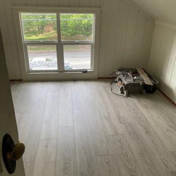 Gc Builders - a room with wood flooring and a window - Flooring Near Me Gc Builders - a room with wood flooring and a window - Flooring Near Me