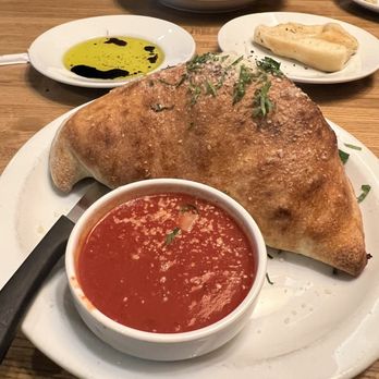 Babbo Italian Eatery - Mushroom Pepperoni and Sausage Calzone - Italian Near Me - Goodyear, Arizona Babbo Italian Eatery - Mushroom Pepperoni and Sausage Calzone - Italian Near Me - Goodyear, Arizona