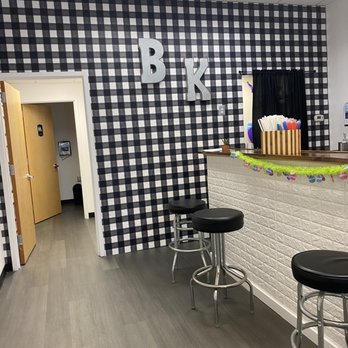 BK Nutrition - a black and white checkered wall - Juice Bars & Smoothies Near Me - Sicklerville, New Jersey