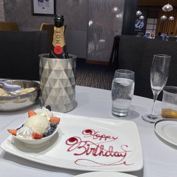 Tado Steakhouse - Birthday dessert!  Vanilla bean ice cream with fruit - Seafood Near Me - Welch, Minnesota