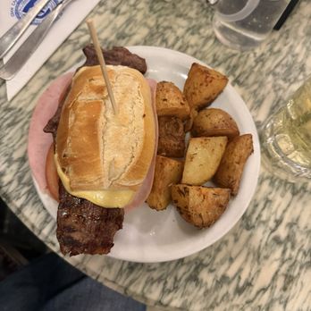 Café Tortoni - Sandwich with lomo, cheese and ham, and rustic potatoes - Coffee & Tea Near Me - Buenos Aires, C Café Tortoni - Sandwich with lomo, cheese and ham, and rustic potatoes - Coffee & Tea Near Me - Buenos Aires, C