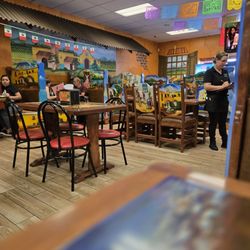 Tres Hermanos - Interior...love the chairs and tables