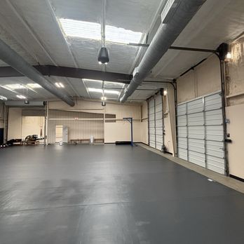 Renegade Roots - Front half of gym. Another one with heavy bags in rear - Muay Thai Near Me - Atlanta, Georgia Renegade Roots - Front half of gym. Another one with heavy bags in rear - Muay Thai Near Me - Atlanta, Georgia