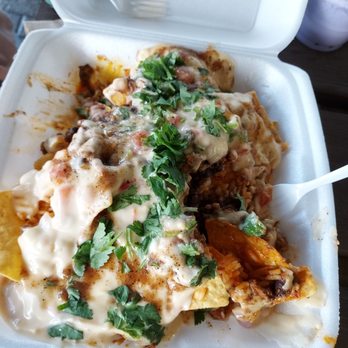 Burrito Bros - Greasy nachos and what seems to be fake cheese - Mexican Near Me - Kansas City, Missouri