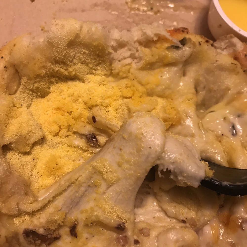 Domino's Pizza - a pizza in a box with a spoon - Pizza Near Me - Far Rockaway, New York Domino's Pizza - a pizza in a box with a spoon - Pizza Near Me - Far Rockaway, New York