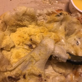 Domino's Pizza - a pizza in a box with a spoon - Pizza Near Me - Far Rockaway, New York