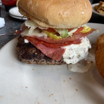 Capps Pizza - Same Toman burger - the huge patty is hanging over the bun! - Pizza Near Me - Painesville, Ohio Capps Pizza - Same Toman burger - the huge patty is hanging over the bun! - Pizza Near Me - Painesville, Ohio