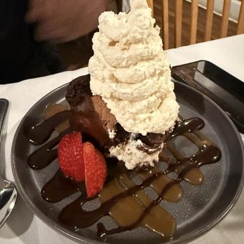 Peasant Village Restaurant - Tuxedo cake - New American Near Me - San Angelo, Texas Peasant Village Restaurant - Tuxedo cake - New American Near Me - San Angelo, Texas