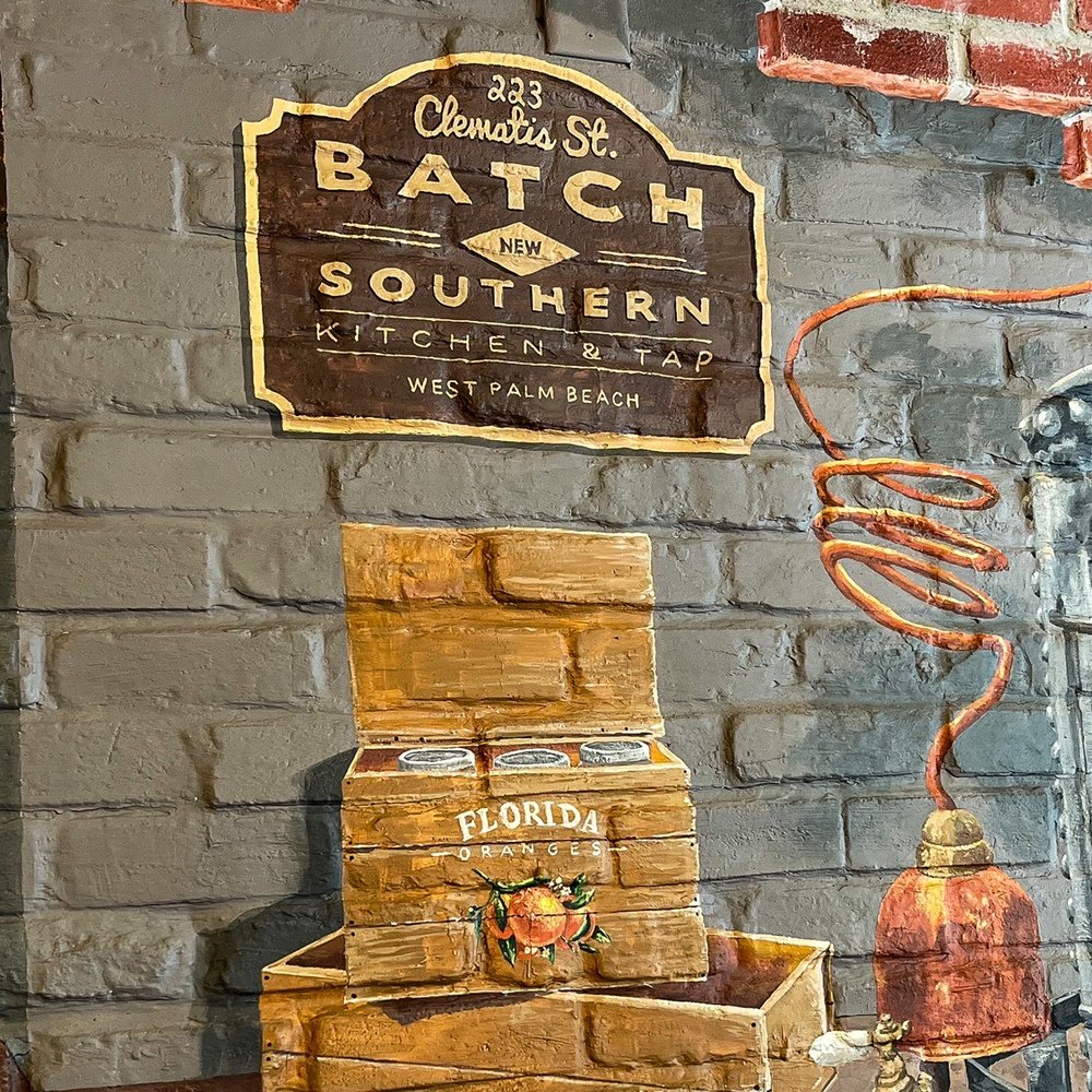 Batch Local Kitchen - Batch brick wall at entrance - Cocktail Bars Near Me - West Palm Beach, Florida