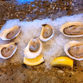 Scales - Three different varieties of oysters. - Seafood Near Me - Portland, Maine Scales - Three different varieties of oysters. - Seafood Near Me - Portland, Maine