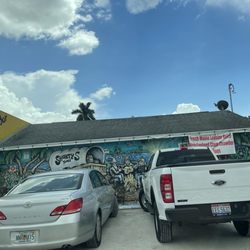 Shorty's Place - A sign that' posts food