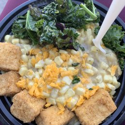 DVV bowl with mashed potatoes, gravy, corn, vegan cheese, tofu chicken nuggets and kale. DVV bowl with mashed potatoes, gravy, corn, vegan cheese, tofu chicken nuggets and kale.