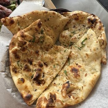 Tikka Indian Cuisine - Garlic Naan - Indian Near Me - Sarasota, Florida Tikka Indian Cuisine - Garlic Naan - Indian Near Me - Sarasota, Florida