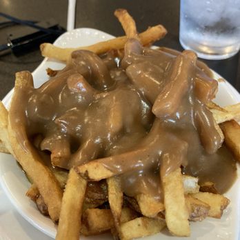 Maple Leaf Diner - Poutine minus the cheese curds. Personal preference. Absolutely delicious!! - American Near Me - Dallas, Texas Maple Leaf Diner - Poutine minus the cheese curds. Personal preference. Absolutely delicious!! - American Near Me - Dallas, Texas