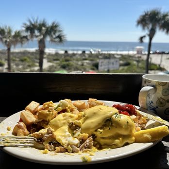 Tortuga Jacks - Crab eggs Benedict. Sorry, I cut into it before taking the picture. So good though! - New Mexican Cuisine Near Me - Amelia Island, Florida Tortuga Jacks - Crab eggs Benedict. Sorry, I cut into it before taking the picture. So good though! - New Mexican Cuisine Near Me - Amelia Island, Florida