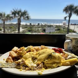 Tortuga Jacks - Crab eggs Benedict. Sorry, I cut into it before taking the picture. So good though!