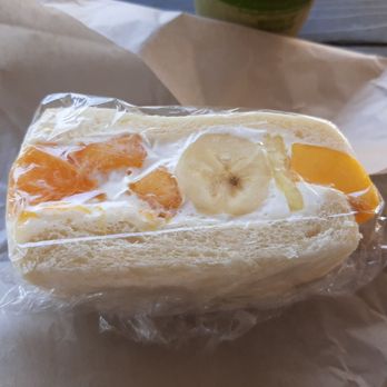 Roots & Craft Tea Roasters - Fresh Fruit Sandwich with big chunks of peach, orange, banana, pineapple and mango - Coffee & Tea Near Me - Oakland, California Roots & Craft Tea Roasters - Fresh Fruit Sandwich with big chunks of peach, orange, banana, pineapple and mango - Coffee & Tea Near Me - Oakland, California