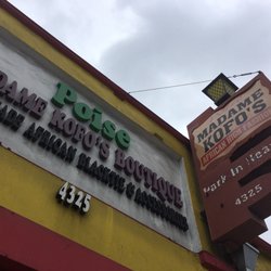 Poise-Madame Kofo's Boutique - Storefront sign