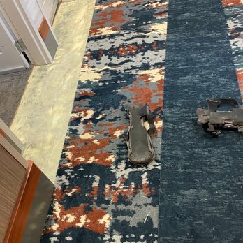 Rod 'N' Reel Resort - This is an image of what looks like someone's joint brace broken in two and laying in the hall's walkway. - Resorts Near Me - Chesapeake Beach, Maryland Rod 'N' Reel Resort - This is an image of what looks like someone's joint brace broken in two and laying in the hall's walkway. - Resorts Near Me - Chesapeake Beach, Maryland
