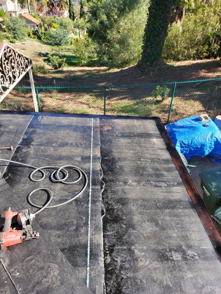 Slide of A DUIN-IT Roofing & Construction