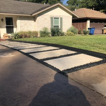 Coyote Moss Landscapes - a concrete walkway in front of a house - Landscaping Near Me - Austin, Texas Coyote Moss Landscapes - a concrete walkway in front of a house - Landscaping Near Me - Austin, Texas