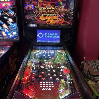 Electric Bat Arcade - This game is amazing! Total Nuclear ANNIHALATION - A pinball machine named 'Total Annihilation' features artwork on the backglass and a digital display, situated in an arcade setting. - Arcades Near Me - Tempe, Arizona