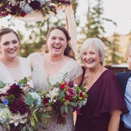 Eryn did the makeup of the bride on the left and the mother in burgundy.