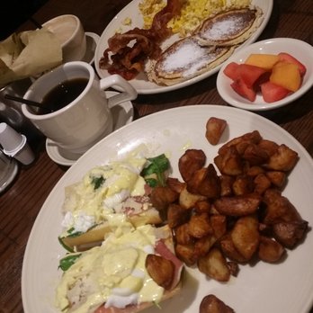 Sergio's Restaurant - Weekend brunch menu. Cuban eggs benedict. Supreme sergio breakfast in background. - Cuban Near Me - Miami, Florida Sergio's Restaurant - Weekend brunch menu. Cuban eggs benedict. Supreme sergio breakfast in background. - Cuban Near Me - Miami, Florida