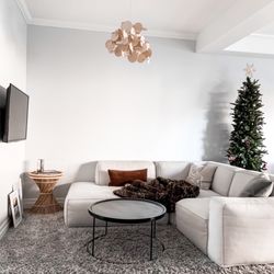The Modern Shop - Normann Copenhagen light fixture from The Modern Shop, pillows from Hay and OyOy!