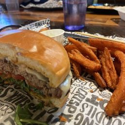 Cheeseburger done to perfection and the most yummy sweet potato fries I've had in a minute! Cheeseburger done to perfection and the most yummy sweet potato fries I've had in a minute!