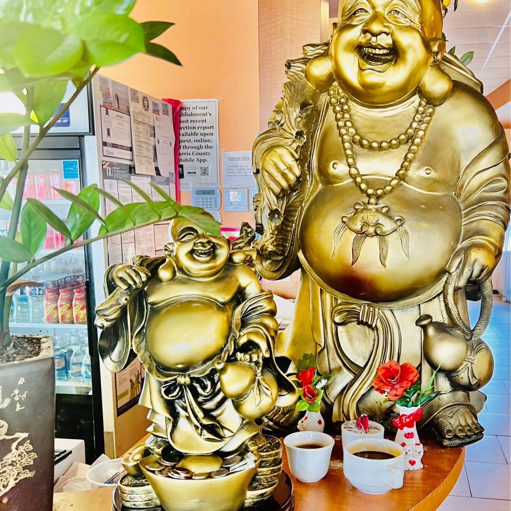 Pho Tau Bay - Peace, Protection, and Good Vibes...Golden Buddha with offerings. - Vietnamese Near Me - Houston, Texas Pho Tau Bay - Peace, Protection, and Good Vibes...Golden Buddha with offerings. - Vietnamese Near Me - Houston, Texas