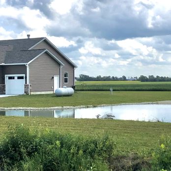 Schumacher Homes - Bowling Green - a pond and garage - General Contractors Near Me Schumacher Homes - Bowling Green - a pond and garage - General Contractors Near Me