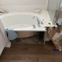 Bathtub with new faucet