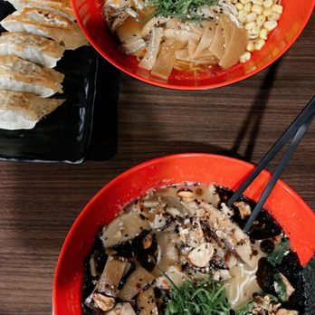 Noods Ramen Bar - Vegan truffle shoyu ramen (top) and vegan black garlic tonkotsu ramen (bottom) with gyozas on the side. - Ramen Near Me - Honolulu, Hawaii Noods Ramen Bar - Vegan truffle shoyu ramen (top) and vegan black garlic tonkotsu ramen (bottom) with gyozas on the side. - Ramen Near Me - Honolulu, Hawaii