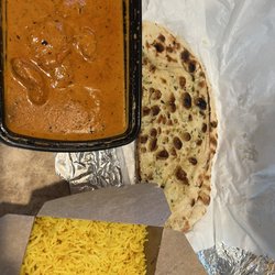 Curry Express - Authentic Indian Cuisine - Butter chicken and garlic naan.