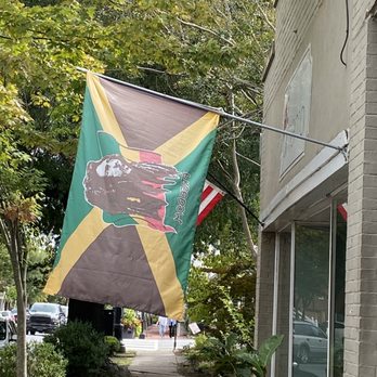 Pimenta - Flag outside - Caribbean Near Me - Fredericksburg, Virginia