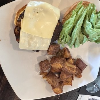 Tipsy Beans Cafe - Black bean burger and home fries. Home fries weren't the best but not the worse either. - Bars Near Me - Williamsburg, Virginia Tipsy Beans Cafe - Black bean burger and home fries. Home fries weren't the best but not the worse either. - Bars Near Me - Williamsburg, Virginia