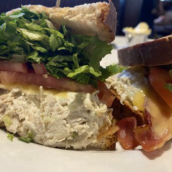 Aubrey's - Cleveland - Chicken sandwich on grilled bread that included bacon and too much shredded lettuce. - American Near Me - Cleveland, Tennessee Aubrey's - Cleveland - Chicken sandwich on grilled bread that included bacon and too much shredded lettuce. - American Near Me - Cleveland, Tennessee