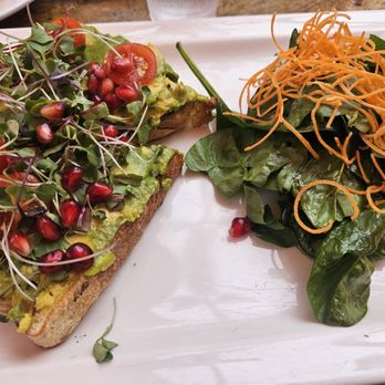 Jeannine's Bakery & Restaurant - Avocado toast with spinach salad and a raspberry vinegrette tastey dressing. - Coffee & Tea Near Me - Santa Barbara, California