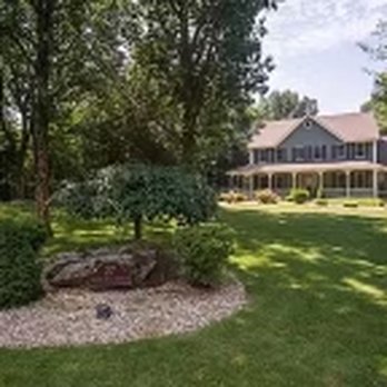 Man Mowing - Front Completed Lawn (Edging, Trimming, Cutting) - Lawn Services Near Me