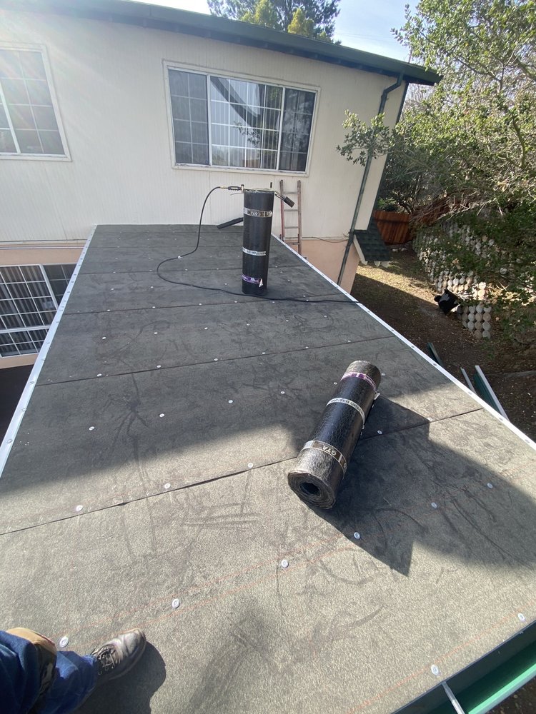 Slide of Tradition Roofing