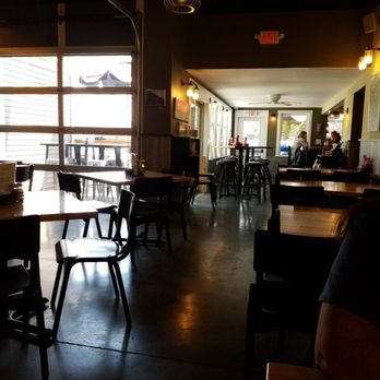 Side Street Cafe - Part of inside with view of outdoor porch tables - American Near Me - Bar Harbor, Maine Side Street Cafe - Part of inside with view of outdoor porch tables - American Near Me - Bar Harbor, Maine