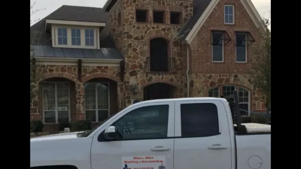 Slide of Mike and Mike Roofing