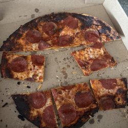 Domino's Pizza - Tried to eat the middle and it was just too burned.