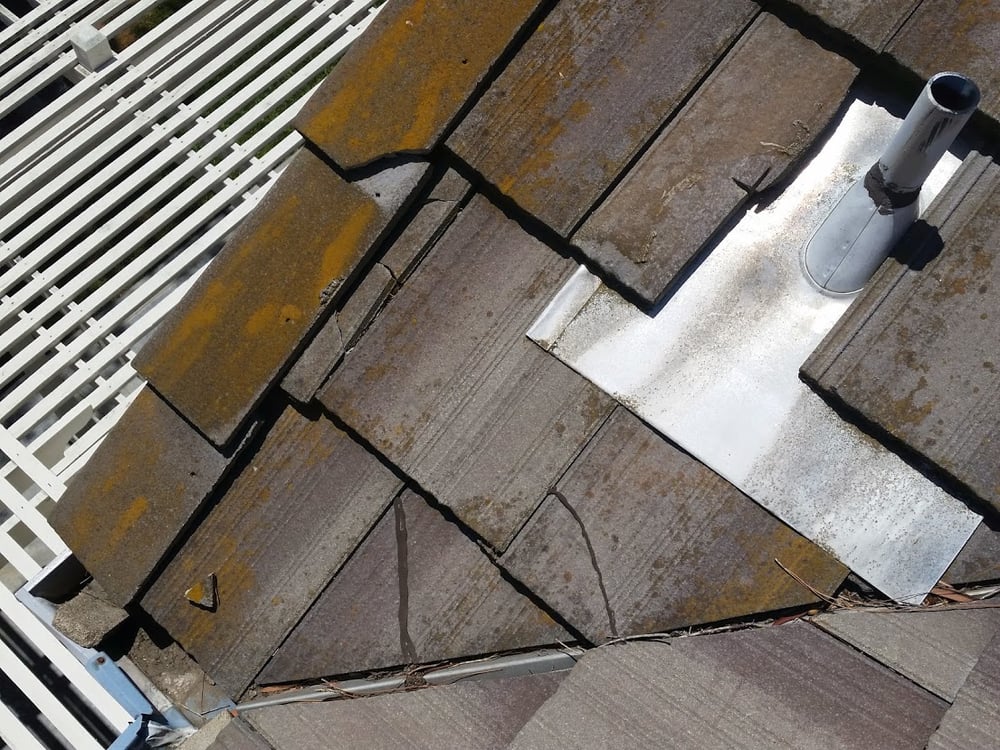 Slide of RT Roofing Specialist